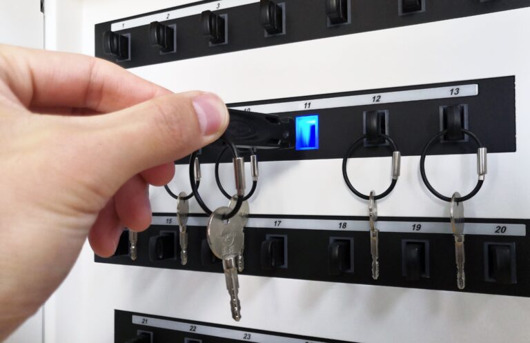 Return a key to K26 key cabinet